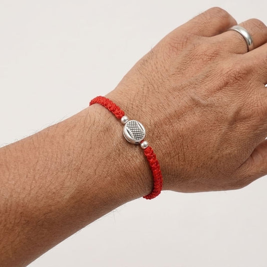 Silver Textured Disc Rakhi
